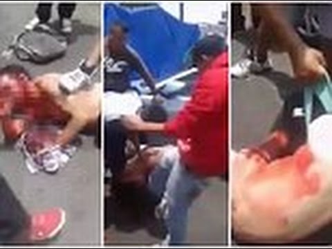 بالفيديو علقة ساخنة لرجل تحرش بامرأة