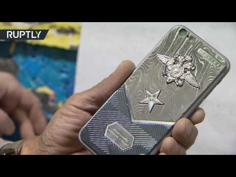 بالفيديو اختبار هاتف آيفون 7 مصنوع بالكامل من مادة التيتنيوم