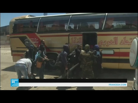بالفيديو مسلحو حي الوعر في حمص يغادرونه إلى إدلب وجرابلس