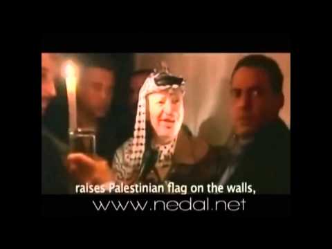 شاهد  الشهيد ياسر عرفات يكشف حقيقة محمود عباس