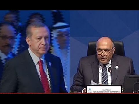 بالفيديو  شكري يتجاهل مصافحة أردوغان خلال تسليم رئاسة القمة الإسلامية