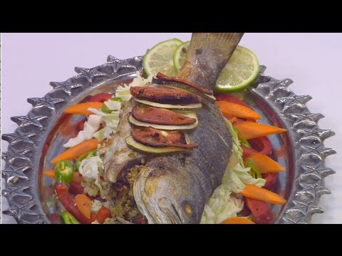 بالفيديو  طريقة عمل سمك محشي أرز و زيتون